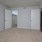 Large bedroom with plush carpet