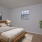 Large bedroom with plush carpet